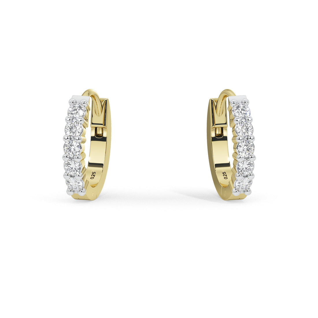 A pair of gold huggie hoop earrings set with clear pavé diamonds, shown on a clean white background.