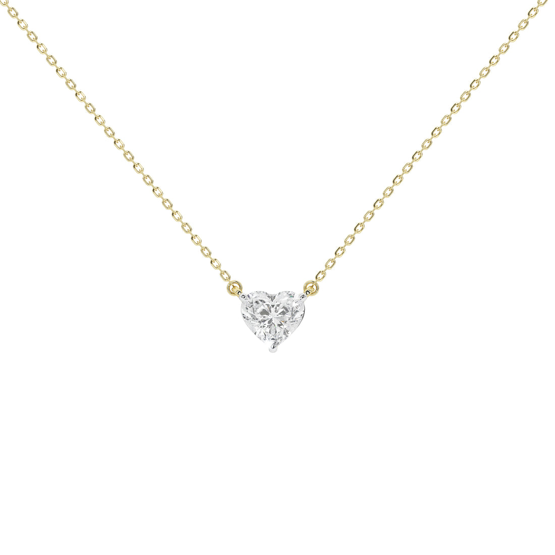 A delicate yellow gold chain necklace with a small heart-shaped diamond pendant on a plain white background.