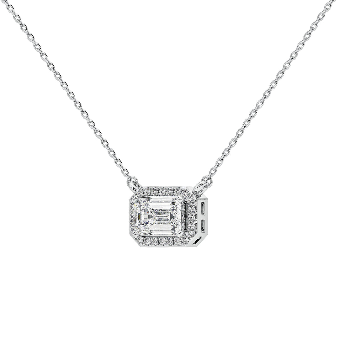 A silver-toned diamond necklace featuring a rectangular halo pendant with an emerald-cut center stone and surrounding pavé accents, displayed on a clean white background.