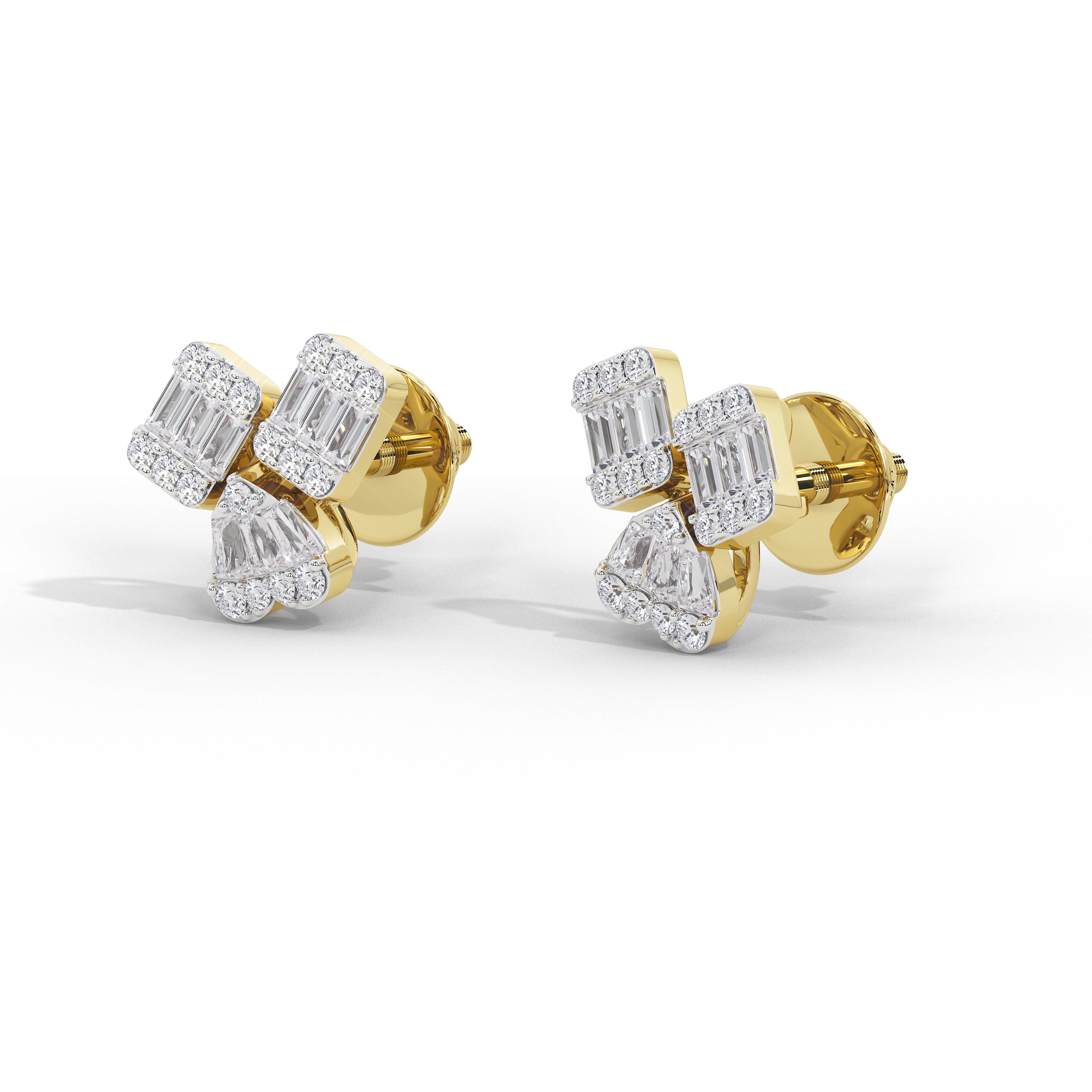 A pair of yellow gold stud earrings featuring baguette and round-cut clear stones, shown on a clean white background.