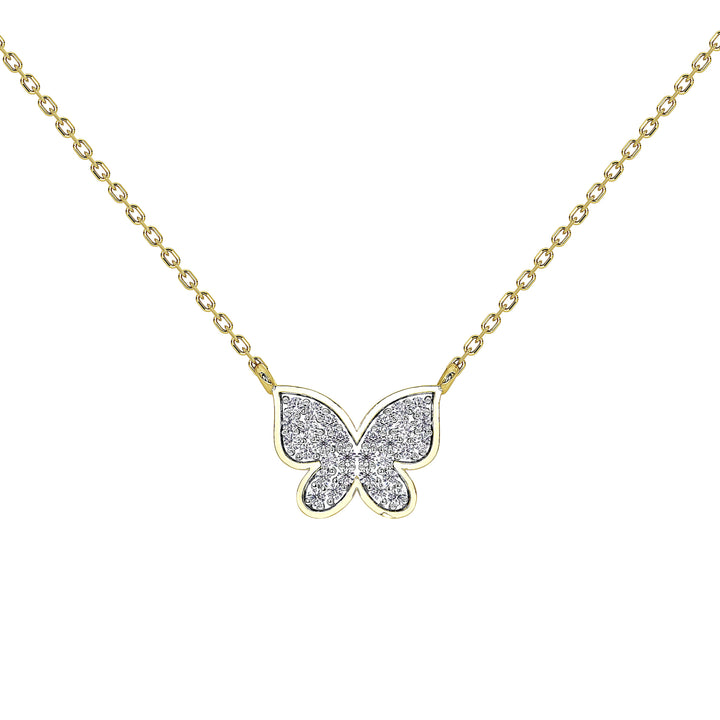 A delicate gold chain necklace featuring a butterfly pendant paved with clear stones, set against a solid white background.
