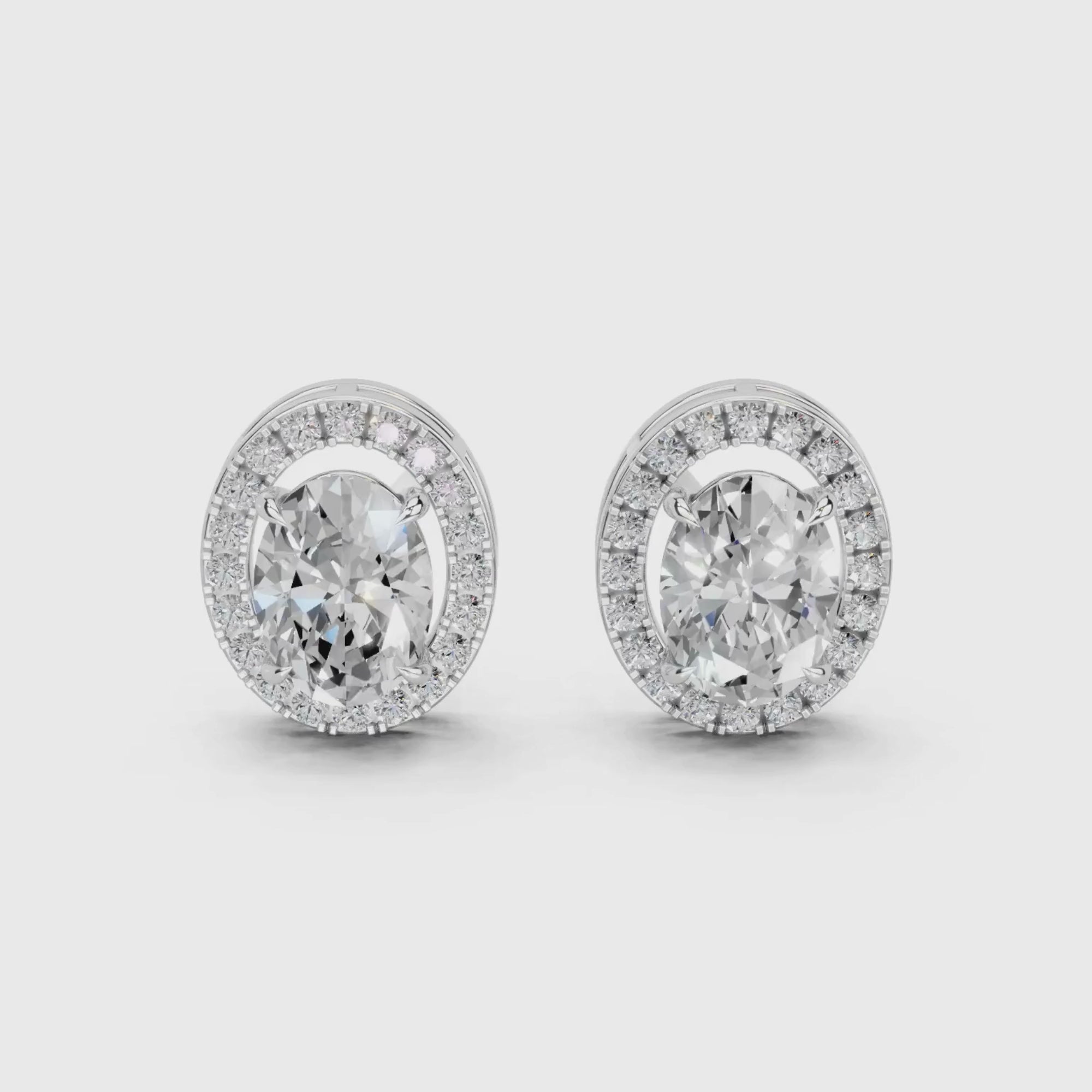 Cynthia Oval Solitaires with detachable Halo Jacket