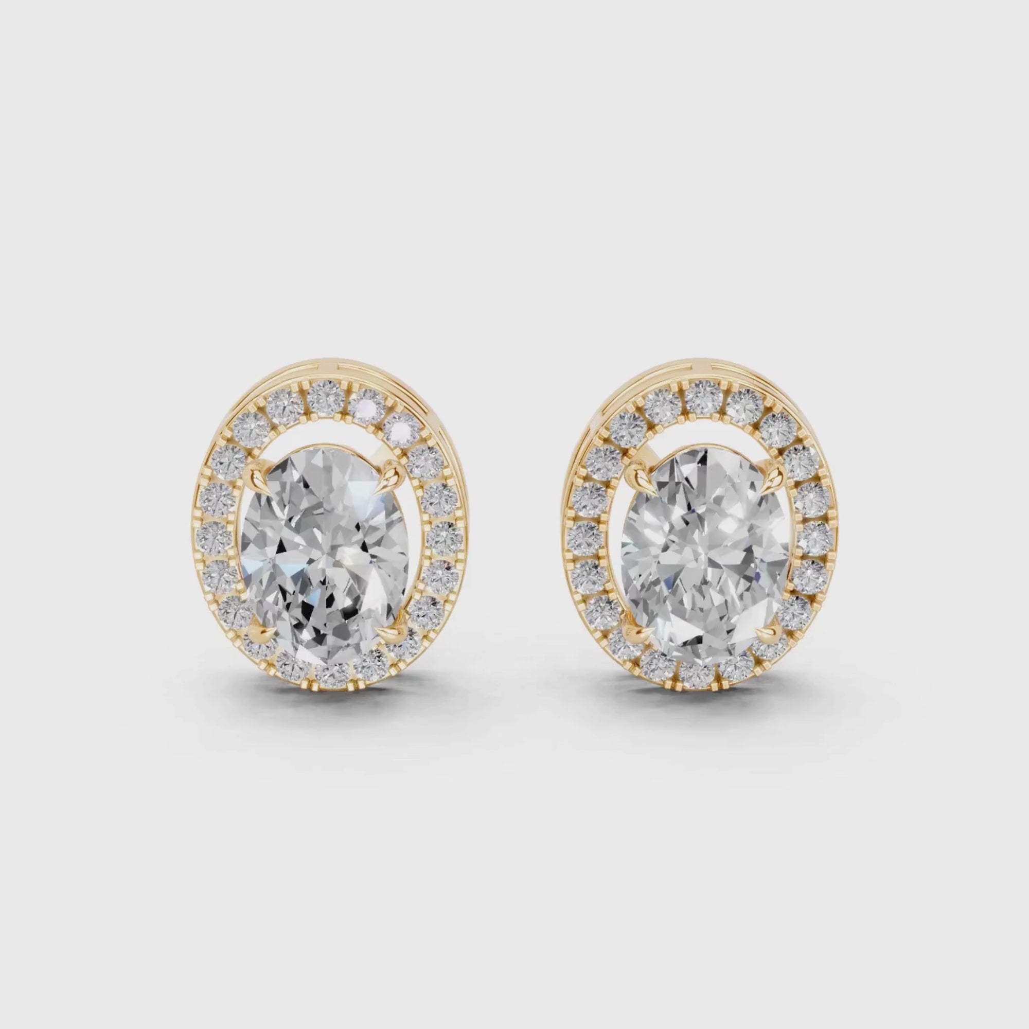 Cynthia Oval Solitaires with detachable Halo Jacket